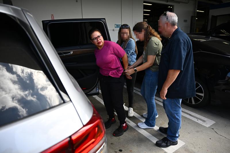 Alma Patricia Contreras Villafana being arrested by Homeland Security agents in Torrance, California